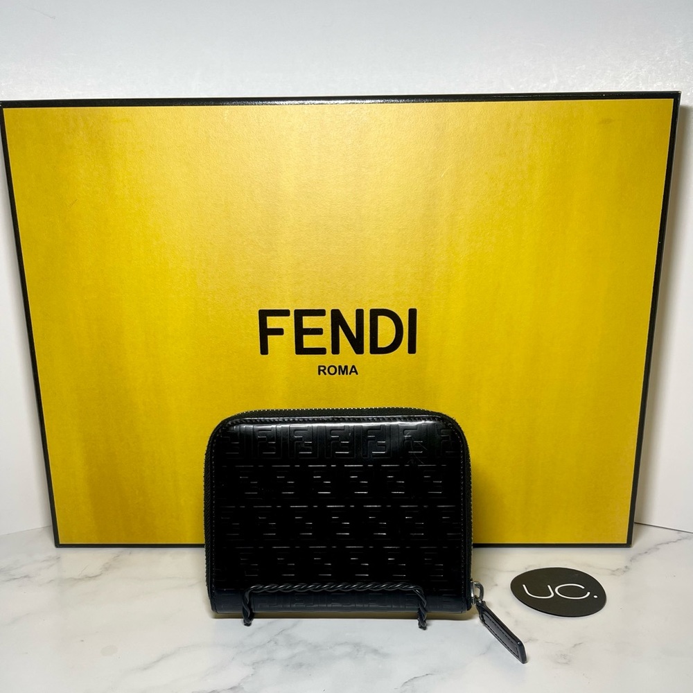 Fendi Logo Embossed Bifold Zipper Wallet in Noir.